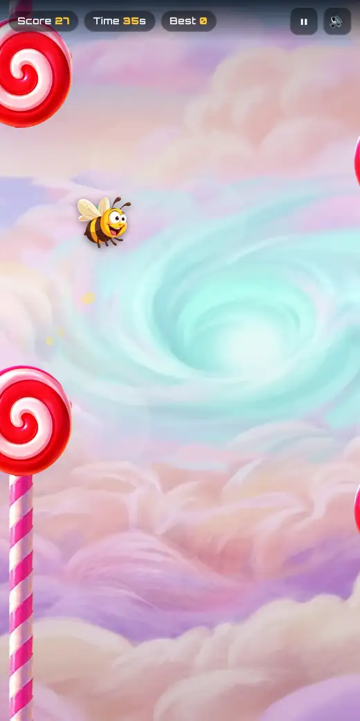 The bee flying high near the top of the screen right after clearing a lollipop pair, score 27 at 35 seconds.